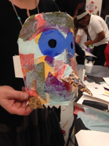 Bird mask made with paper and tissue collage