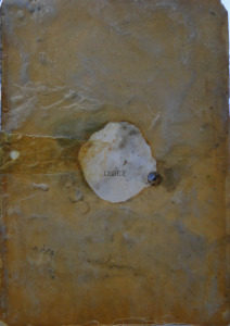 Encaustic, collage on book page