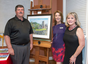 Paul and Joan Czerwin of Advanced Power Control, LLC with Nanci and their framed print.